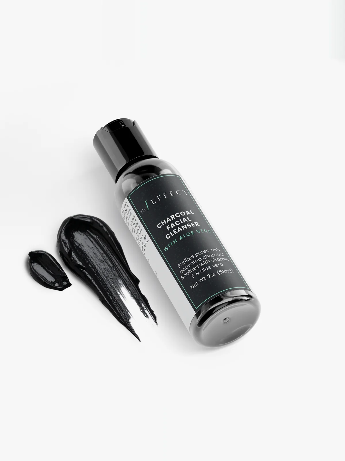 Pure Slate texture close-up: smooth charcoal-black gel that turns to a soft grey lather